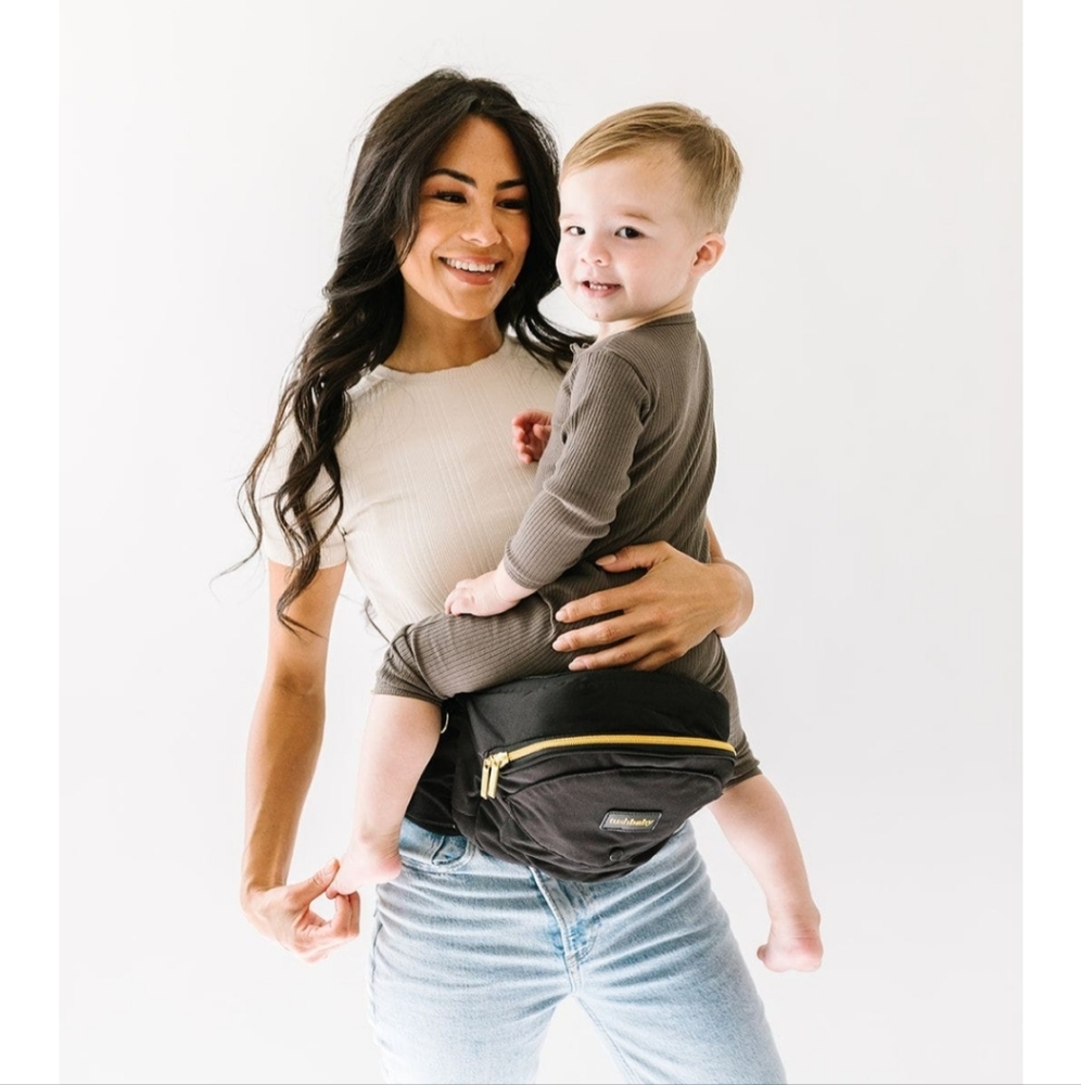 Tushbaby Hip Carrier in black and gold
